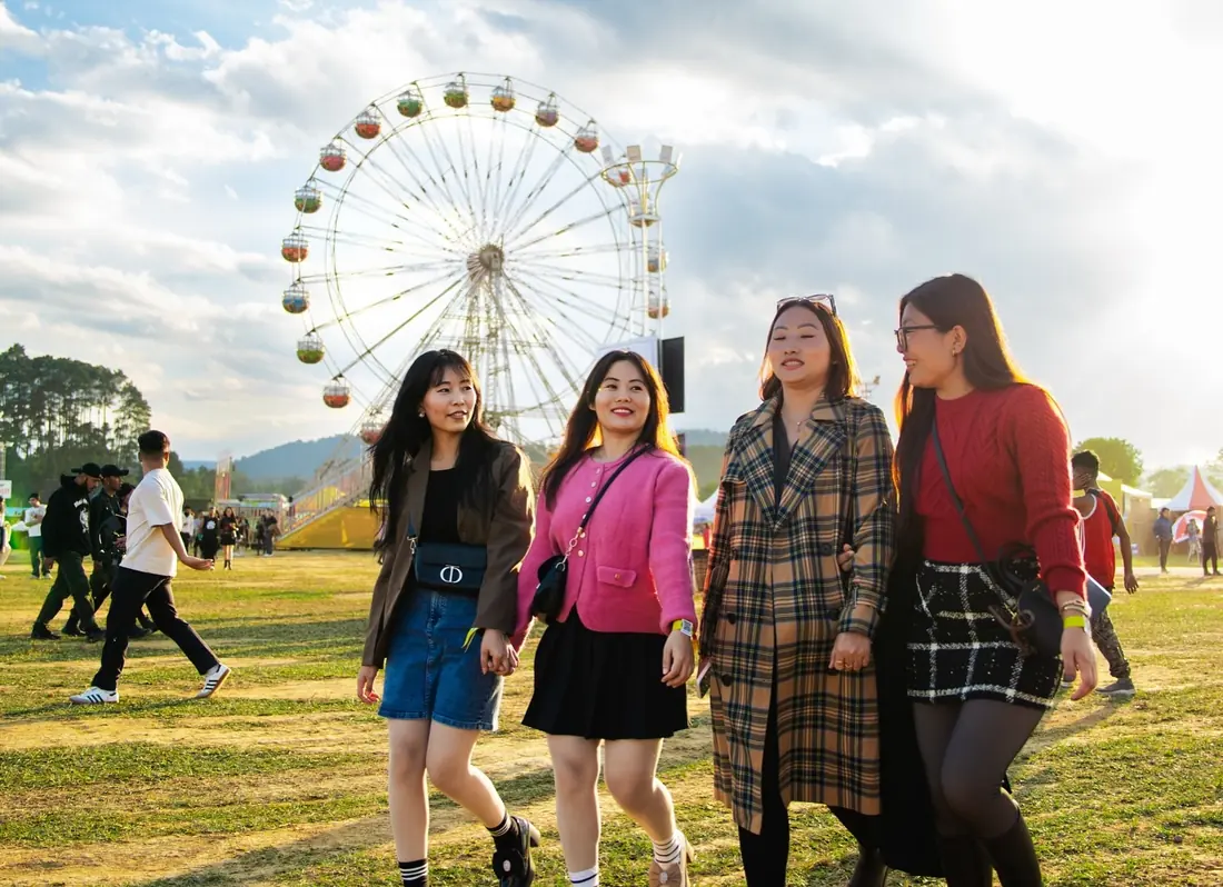 Four friends at the Cherry Blossom Festival grounds