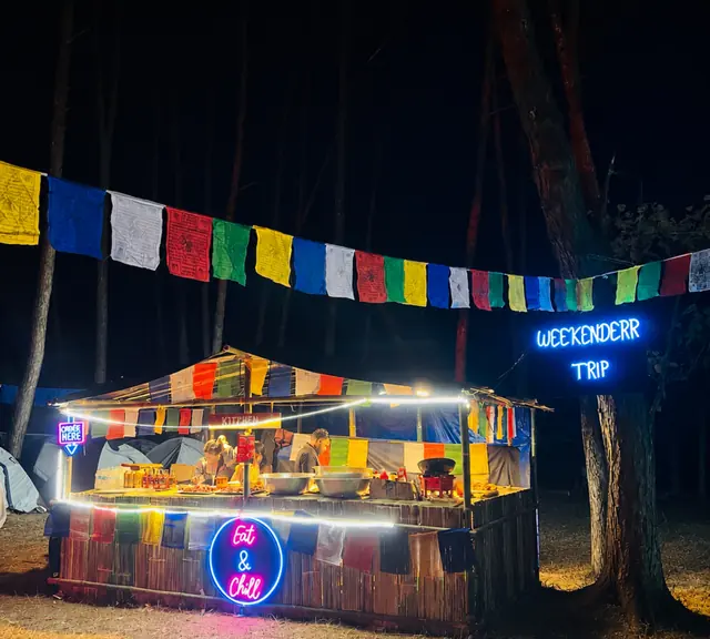 The Weekenderr live kitchen lit up at night
